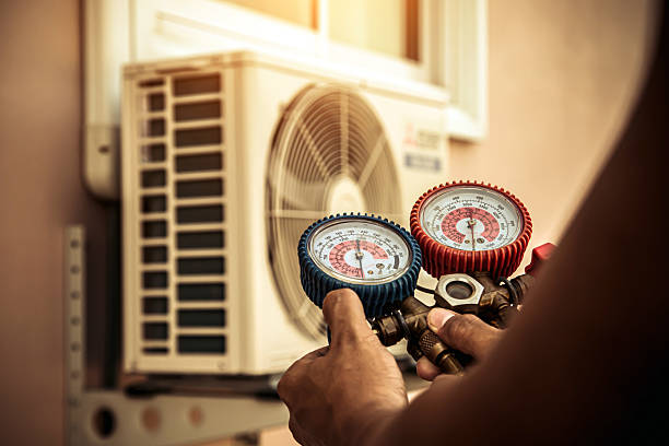 Professional Hvac technician working in Queensbury, NY